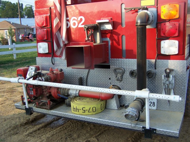 Capt. Bryant's improvement for watering the fairground track during this years Demo Derby. Is this thing patented???